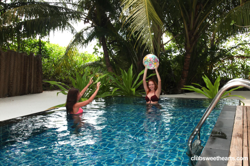 Girlfriends having fun in the pool