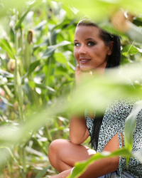 Jay plugs Ines in a corn field