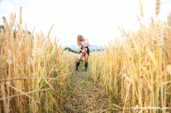 Schoolgirl-pleasuring-herself-in-a-wheat-field