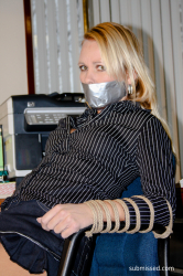 Secretary-Tied-To-Chair-Tapegagged