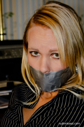 Secretary-Tied-To-Chair-Tapegagged