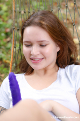 Shelley-Bliss-masturbating-in-garden-hammock