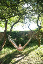 Cutie-pie-finger-fucking-in-a-hammock