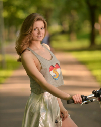 Cam girl Merry Pie riding her bike without panties