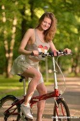 Cam-girl-Merry-Pie-riding-her-bike-without-panties