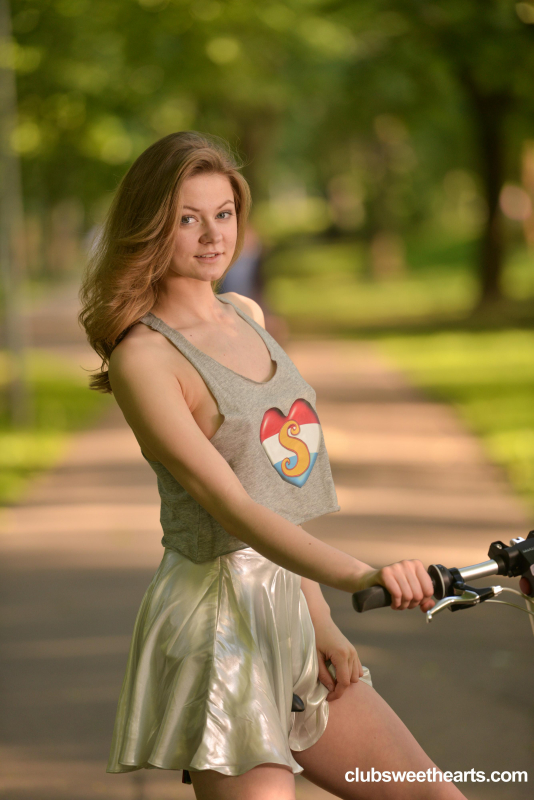 Cam girl Merry Pie riding her bike without panties