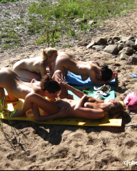 Sweet lesbians making out on the beach